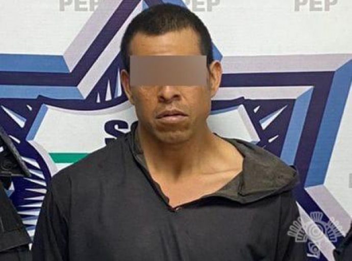 Detienen a masculino en San Jerónimo Tecuanipan por presunta posesión ilegal de arma de fuego. 